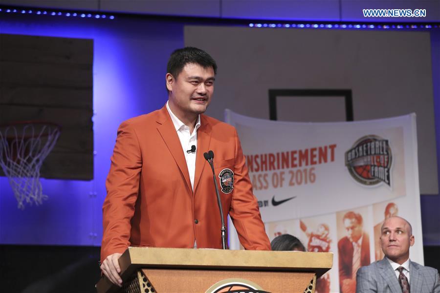 2016 class of inductees into the Basketball Hall of Fame, Yao Ming of China speaks during a press conference at the Naismith Memorial Basketball Hall of Fame, on September 8, 2016. Chinese basketball star Yao Ming and his Class of 2016 Hall of Fame made their debut Thursday with orange inductee jackets for the upcoming Enshrinement Ceremony in Springfield, Massachusetts. The enshrinement ceremony will be held on September 9, 2016. [Photo: Xinhua/Wang Ying]