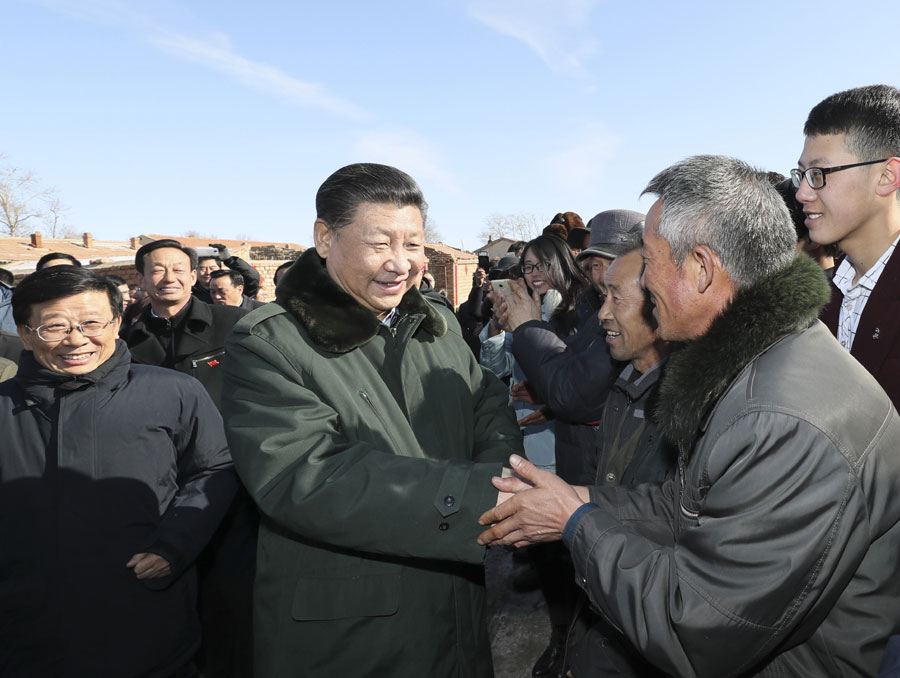 Chinese President Xi Jinping inspects a rural village in Zhangbei County, Zhangjiajie of north China's Hebei Province, on January 24, 2017. [Photo: Xinhua]