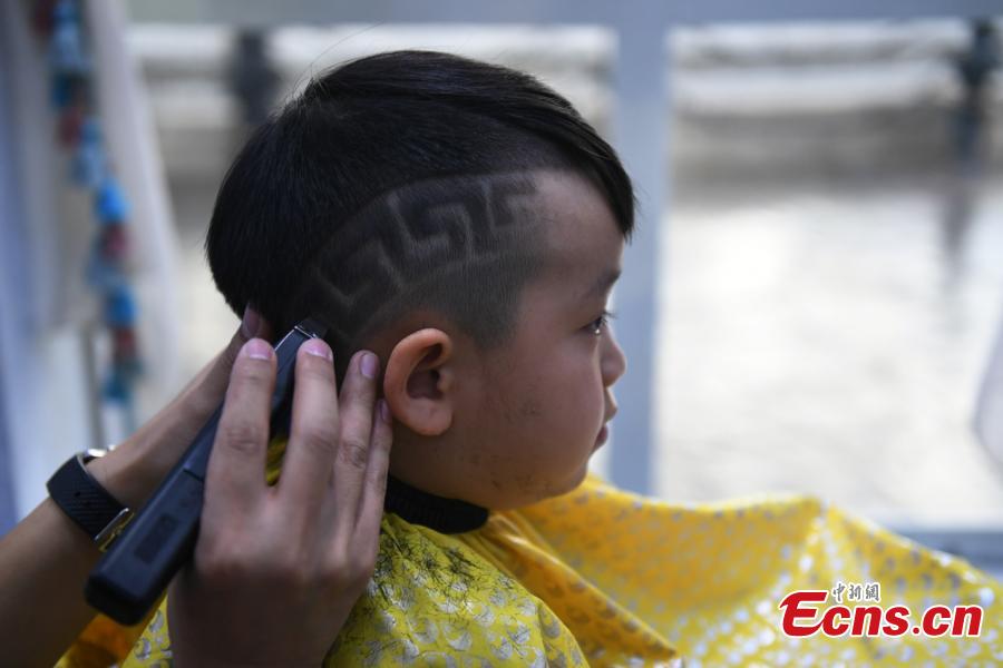 Young Chinese Boy Using Mobile Phone On Sofa At Home Stock Photo, Picture  and Royalty Free Image. Image 18709925.