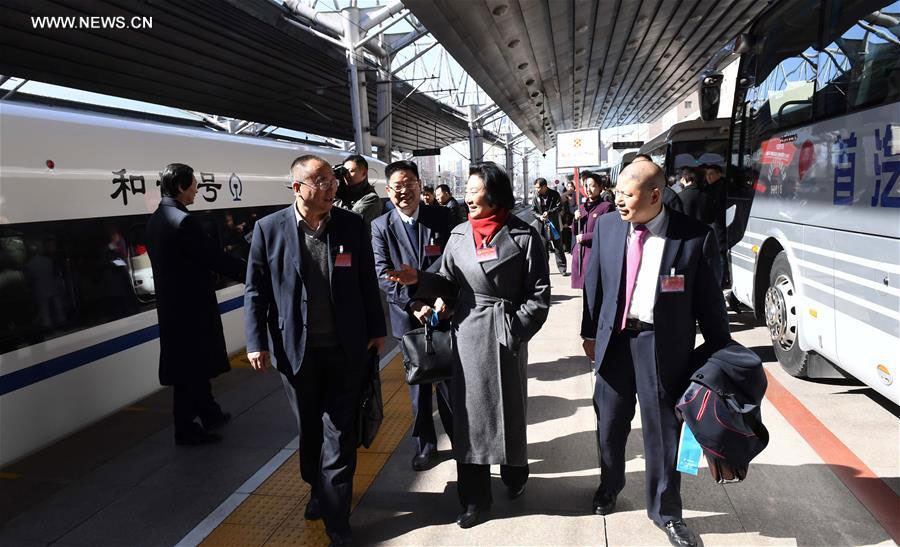 Members of the 12th National Committee of the Chinese People's Political Consultative Conference (CPPCC) from central China's Henan Province arrive in Beijing, capital of China, March 1, 2017, for the Fifth Session of the 12th CPPCC National Committee. [Photo: Xinhua/Zhang Duo]