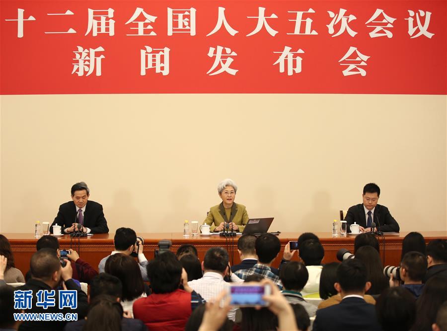 Fu Ying (C, rear), spokesperson for the fifth session of China's 12th National People's Congress (NPC), speaks during a press conference on the session at the Great Hall of the People in Beijing, capital of China, March 4, 2017. The fifth session of the 12th NPC is scheduled to open in Beijing on March 5. [Photo: Xinhua]