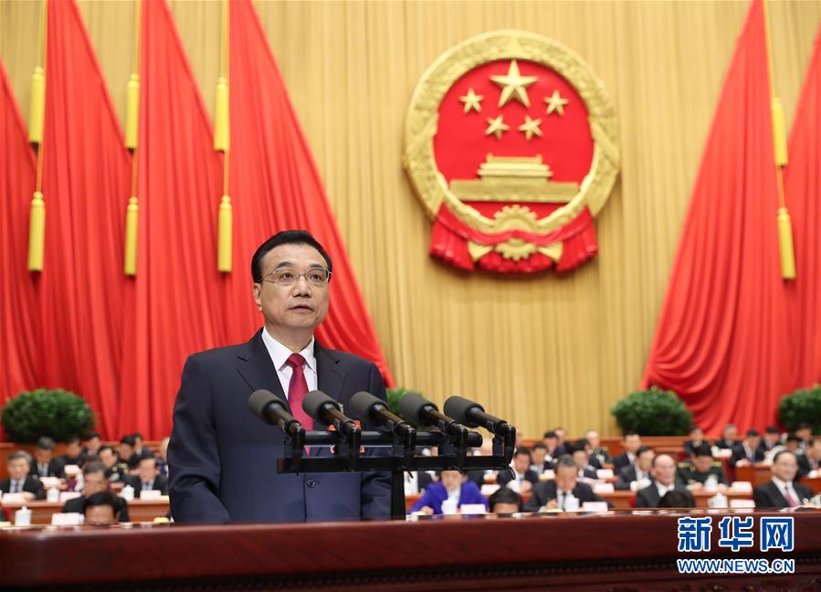 Chinese Premier Li Keqiang delivers the government work report at the opening of the Fifth Session of the 12th National People's Congress in the Great Hall of the People in Beijing on Sunday, March 5, 2017. [Photo: Xinhua]