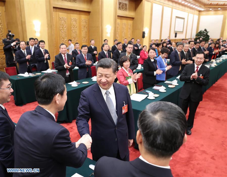 Chinese President Xi Jinping joins a panel discussion with deputies to the 12th National People's Congress (NPC) from Liaoning Province at the annual session of the NPC in Beijing, capital of China, March 7, 2017. [Photo: Xinhua]