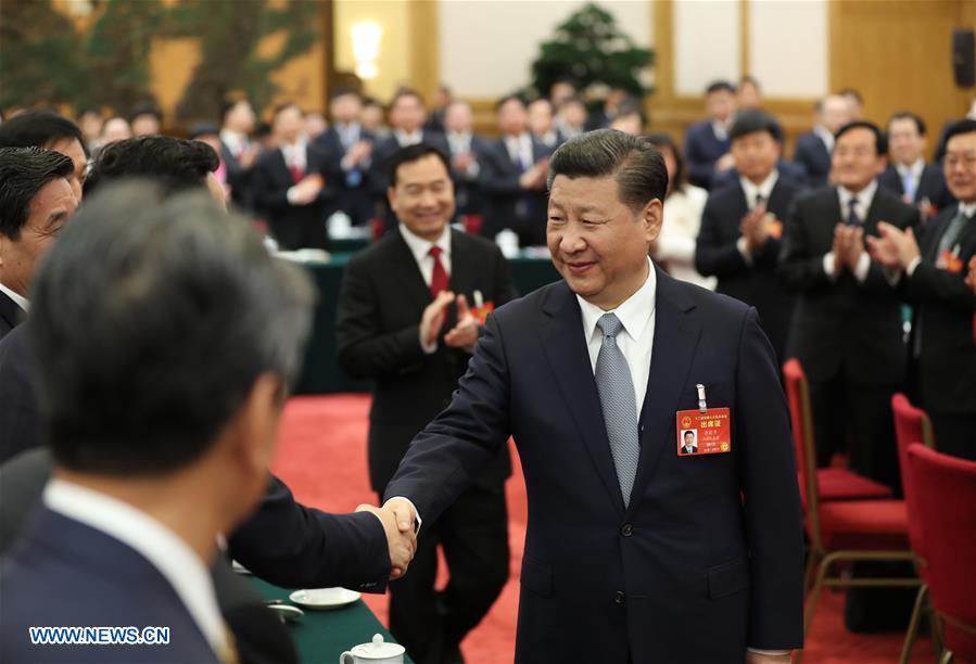 Chinese President Xi Jinping joins a panel discussion with deputies to the 12th National People's Congress (NPC) from Liaoning Province at the annual session of the NPC in Beijing, capital of China, March 7, 2017. [Photo: Xinhua]