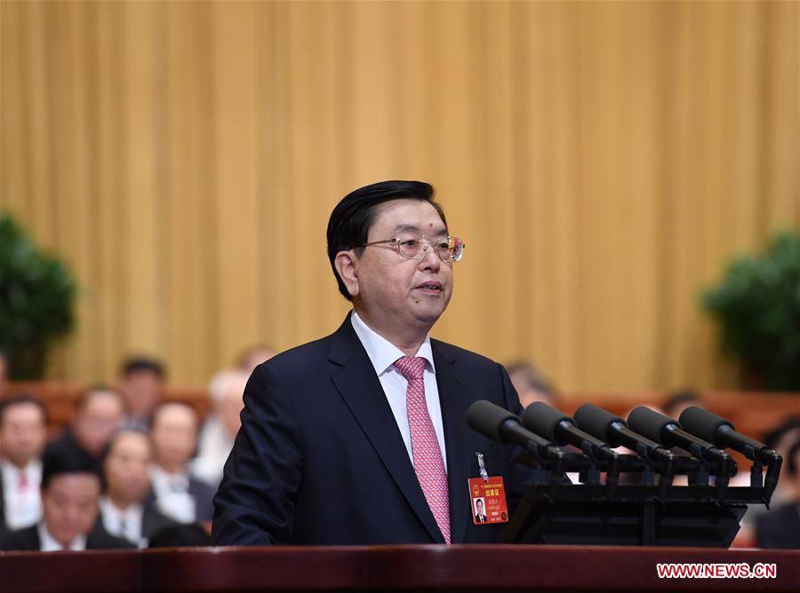 Zhang Dejiang, chairman of the Standing Committee of China's National People's Congress (NPC), delivers a work report of the NPC Standing Committee during the second plenary meeting of the fifth session of the 12th NPC at the Great Hall of the People in Beijing, capital of China, March 8, 2017. [Photo: Xinhua]