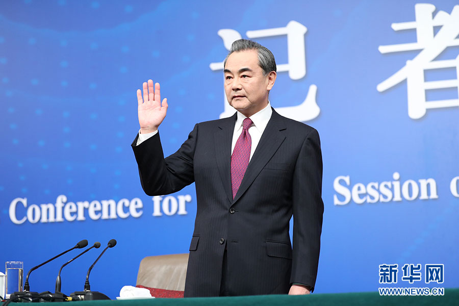 Chinese Foreign Minister Wang Yi meets the press on the sidelines of the national legislature annual session in Beijing, on March 8, 2017. [Photo: Xinhua]