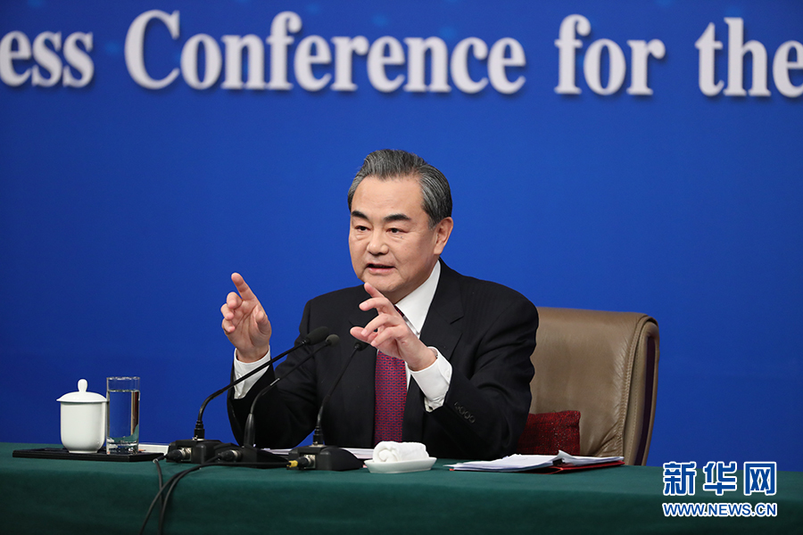 Chinese Foreign Minister Wang Yi meets the press on the sidelines of the national legislature annual session in Beijing, on March 8, 2017. [Photo: Xinhua]