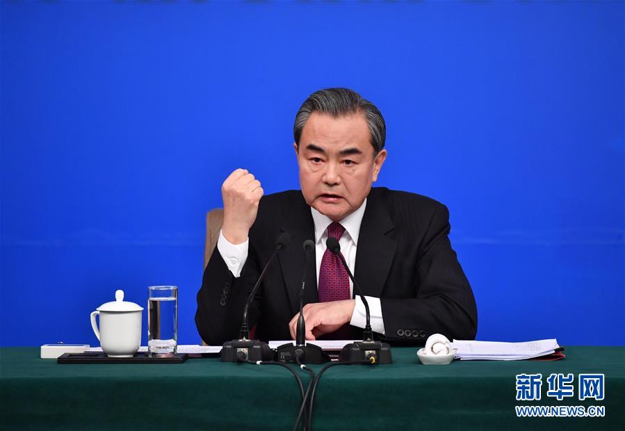 Chinese Foreign Minister Wang Yi meets the press on the sidelines of the national legislature annual session in Beijing, on March 8, 2017. [Photo: Xinhua]