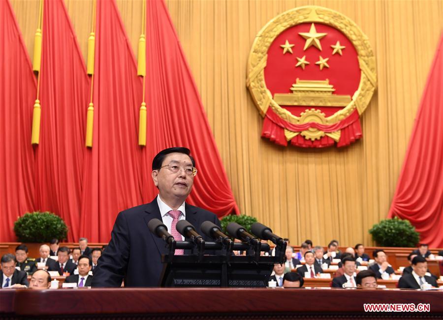 Zhang Dejiang, chairman of the Standing Committee of China's National People's Congress (NPC), delivers a work report of the NPC Standing Committee during the second plenary meeting of the fifth session of the 12th NPC at the Great Hall of the People in Beijing, capital of China, March 8, 2017. [Photo: Xinhua]