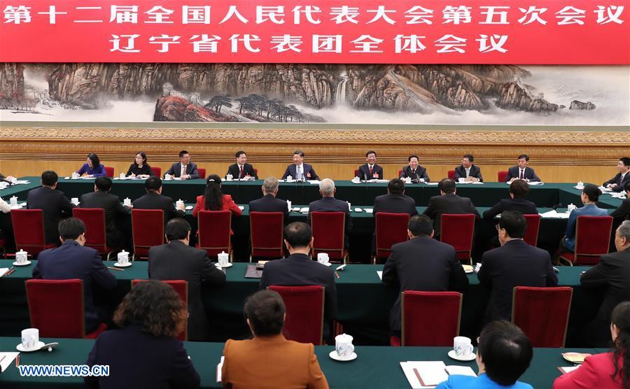 Chinese President Xi Jinping joins a panel discussion with deputies to the 12th National People's Congress (NPC) from Liaoning Province at the annual session of the NPC in Beijing, capital of China, March 7, 2017. [Photo: Xinhua]