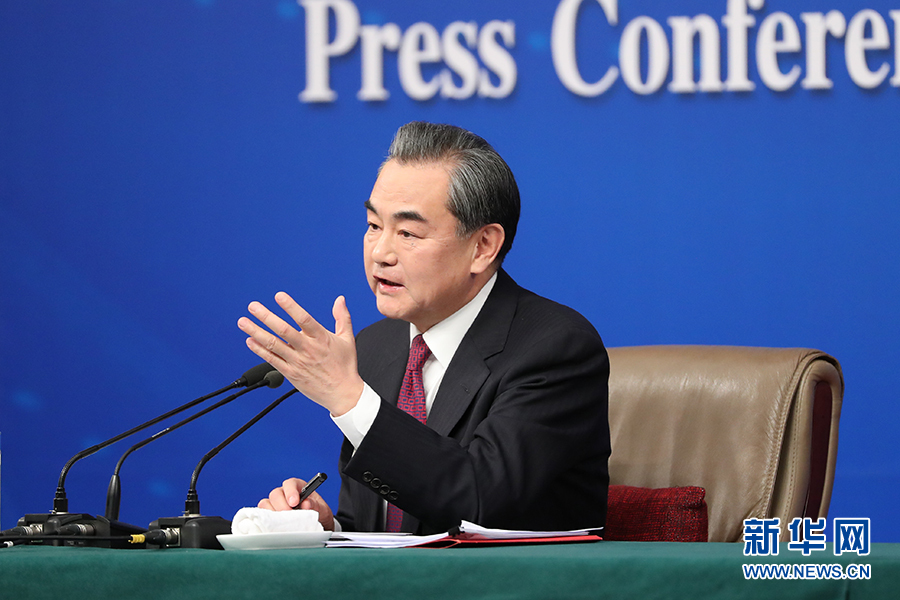 Chinese Foreign Minister Wang Yi meets the press on the sidelines of the national legislature annual session in Beijing, on March 8, 2017. [Photo: Xinhua]