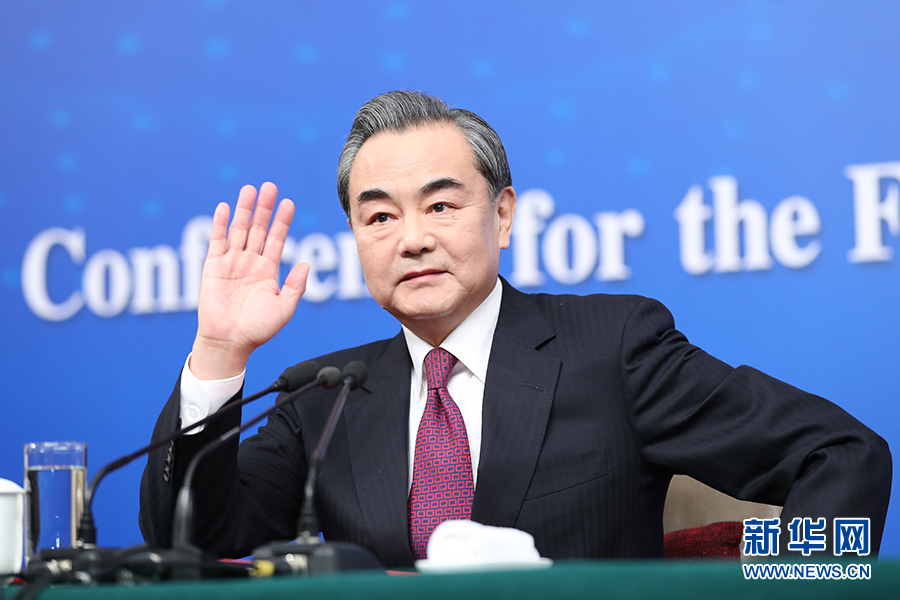 Chinese Foreign Minister Wang Yi meets the press on the sidelines of the national legislature annual session in Beijing, on March 8, 2017. [Photo: Xinhua]