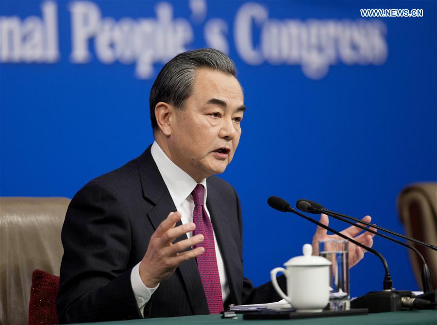 Chinese Foreign Minister Wang Yi answers questions on China's foreign policy and foreign relations at a press conference for the fifth session of the 12th National People's Congress in Beijing, capital of China, March 8, 2017. [Photo: Xinhua/Cui Xinyu]