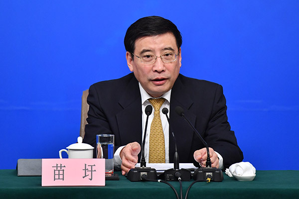 Miao Wei, minister of industry and information technology, answers questions at a press conference for the fifth session of the 12th NPC in Beijing, capital of China, March 11, 2017. [Photo: Xinhua]