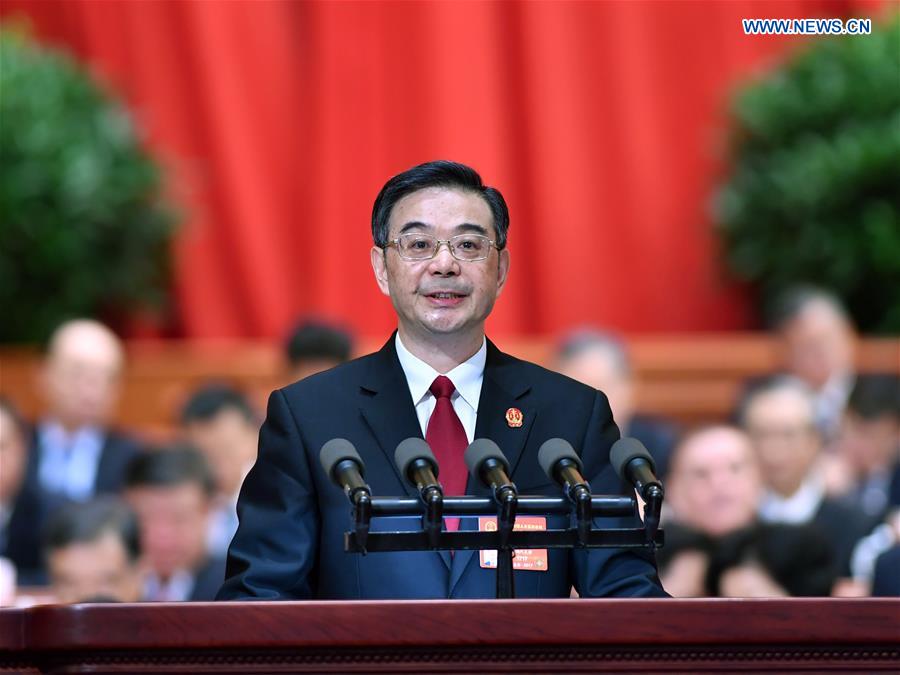 Chief Justice Zhou Qiang delivers a work report of the Supreme People's Court at the third plenary meeting of the fifth session of the 12th National People's Congress at the Great Hall of the People in Beijing, capital of China, March 12, 2017. [Photo: Xinhua/Li Tao]
