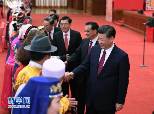 Chinese President Xi Jinping meets with ethnic minority lawmakers and political advisors on March 11. [Photo: Xinhua]