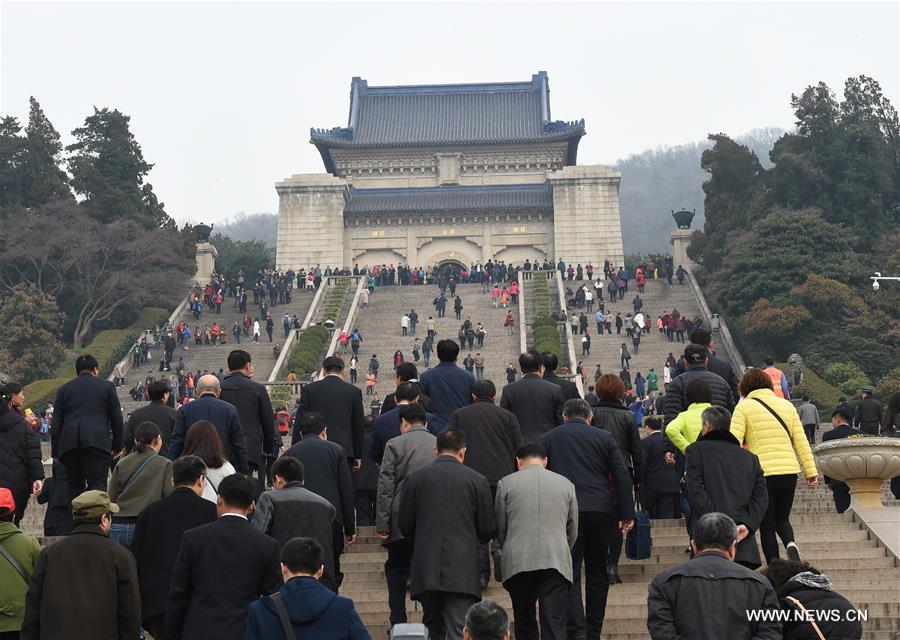 People gather to attend a ceremony to commemorate the 92nd anniversary of the death of Dr. Sun Yat-sen at the Sun Yat-sen Mausoleum in Nanjing, capital of east China's Jiangsu Province, March 12, 2017. Sun was born in 1866 and is known to the Chinese people as a "great revolutionary and statesman" for his leading role during the 1911 Revolution, which ended more than 2,000 years of feudal rule in China. [Photo: Xinhua/Sun Can]