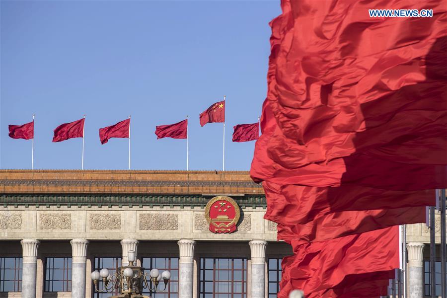 Photo taken on March 12, 2017 shows red flags at the Tian'anmen Square in Beijing, capital of China. The third plenary meeting of the fifth session of the 12th National People's Congress opened in Beijing on Sunday. [Photo: Xinhua/Fei Maohua]