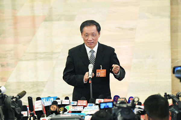 Li Jinzao, head of the China's National Tourism Administration, receives an interview before the 3rd plenary meeting of the 5th session of the 12th National People's Congress (NPC) at the Great Hall of the People in Beijing on March 12, 2017. [Photo: Xinhua/Zhao Yingquan]
