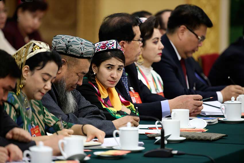 Rehangul Yimir at a panel discussion in Beijing on March 12, 2017 during the National People's Congress. [Photo: China Daily]