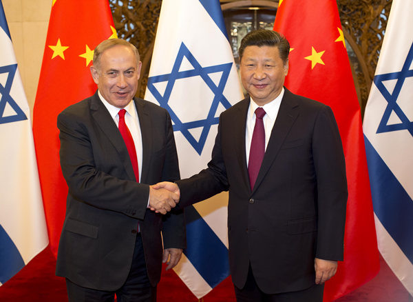 Chinese President Xi Jinping (Right) meets with Israeli Prime Minister Benjamin Netanyahu in Beijing on Tuesday, March 21, 2017. [Photo: China Daily]