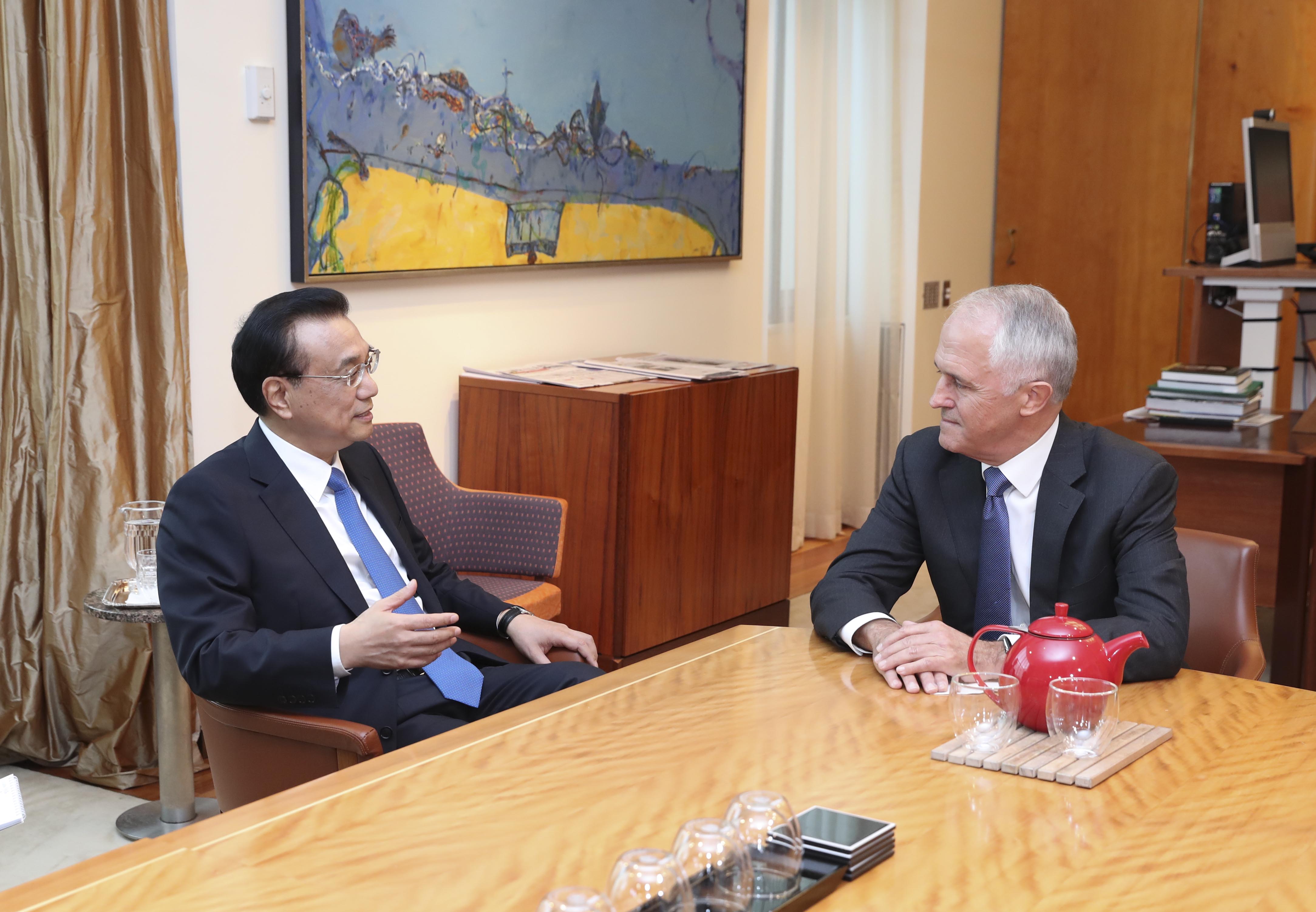 Chinese Premier Li Keqiang meets his Australian counterpart Malcolm Turnbull in Canberra, Australia, on Thursday, March 23, 2017. Li said during the meeting that China will expand the scope of opening-up, and promote trade and investment liberalization and facilitation as well as uphold the current global trading system. [Photo: gov.cn]