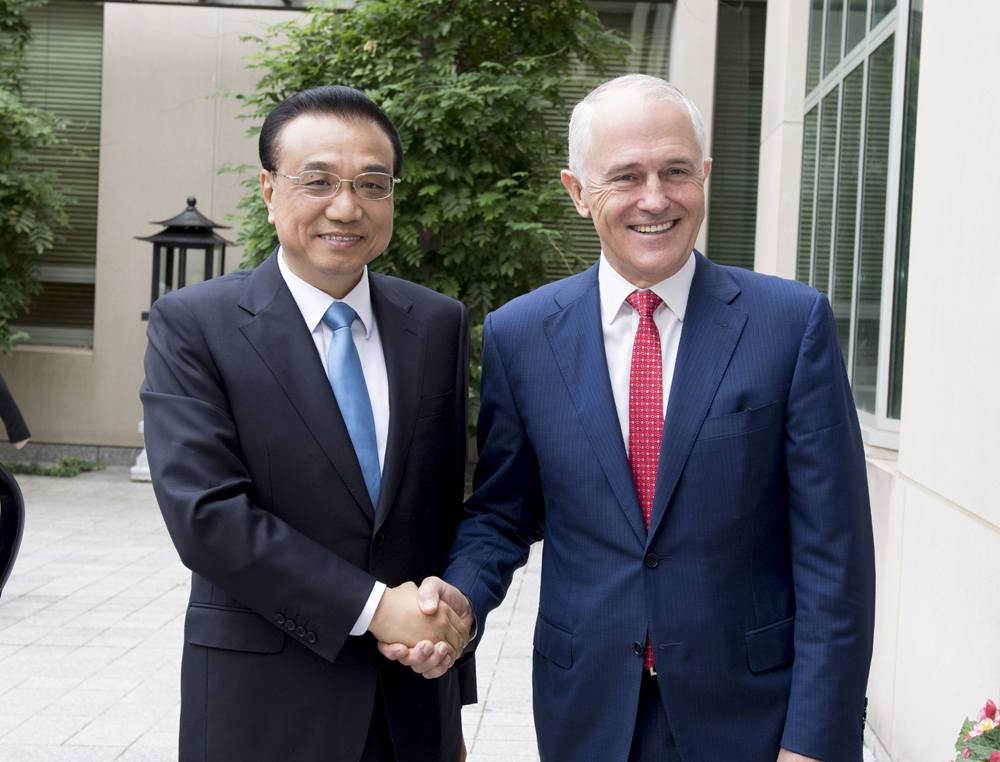 Visiting Chinese Premier Li Keqiang and Australian Prime Minister Malcolm Turnbull hold the fifth annual meeting of the two Prime Ministers in Canberra, Australia on Friday, March 24, 2017. The two sides discussed the development of China-Australia relations and exchanged views on regional and international issues of common concern. [Photo: gov.cn]