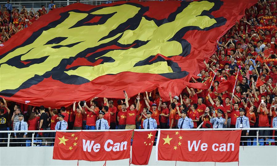Supporters cheer for Team China prior to the Russia 2018 World Cup Asian Qualifier match between China and Iran in Shenyang, capital of northeast China's Liaoning Province, on Sept. 6, 2016. [Photo: Xinhua]
