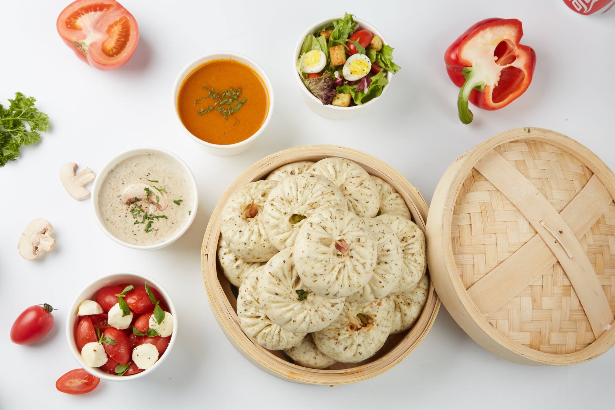 Traditional Chinese steamed buns called "Baozi" with meat filling have been redesigned by innovative entrepreneurs Alex Cree and Loren Heinold, using a savory steamed dough and filling it with pizza ingredients. [Photos: Baozza/Alex Cree]