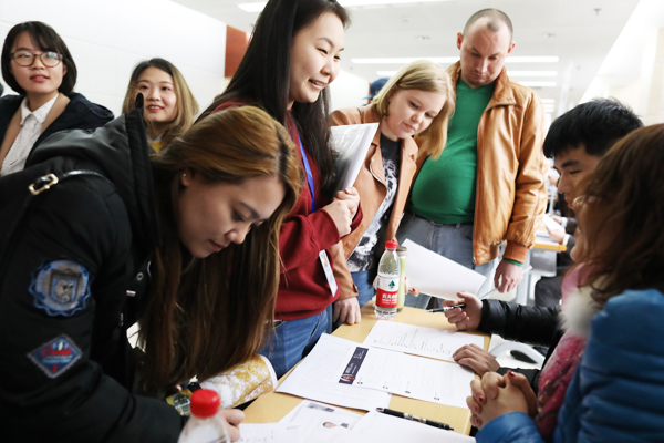 Foreign students attend a job fair at Zhongguancun high-tech zone in Beijing on March 23, 2017. [Photo: China Daily]