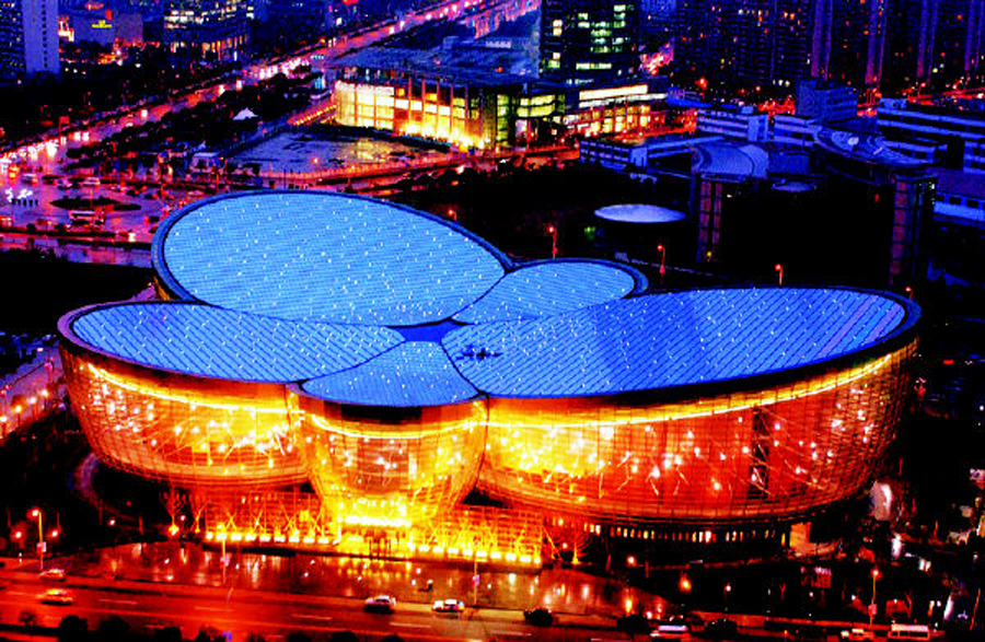 This is a night view of the Oriental Art Center in Shanghai Pudong New Area. [Photo: Xinhua]