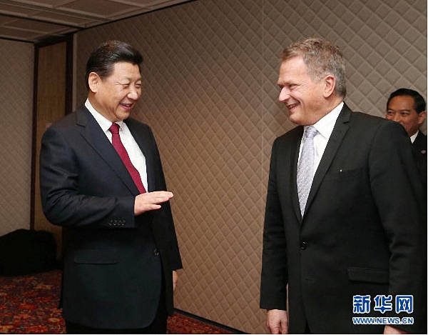Chinese President Xi Jinping (L) meets with the President of Finland Sauli Niinisto in Noordwijk, the Netherlands, on March 23, 2014. [File photo: Xinhua]