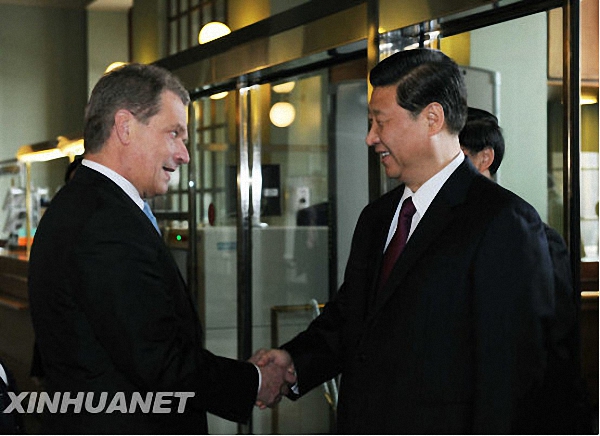 Xi Jinping (R) shakes hands with Sauli Niinisto, who was Speaker of the Finnish Parliament at that time, in Helsinki, Finland, on March 26, 2010. [File photo: Xinhua]