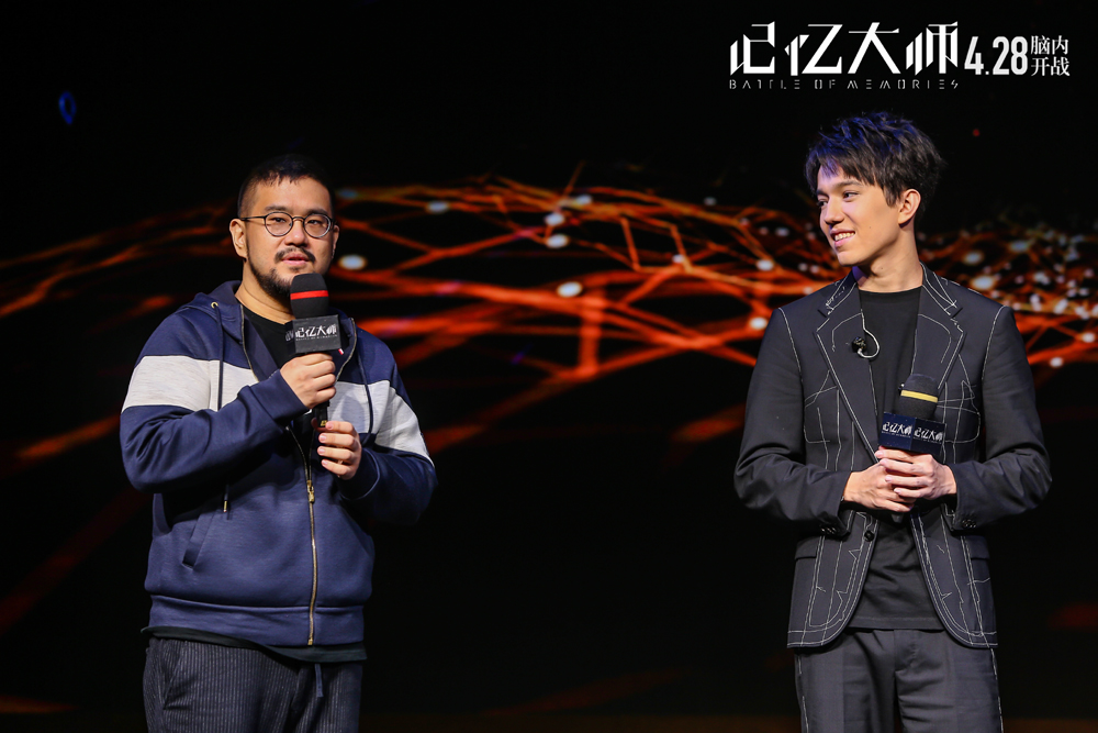 Director Leste Chen and Dimash Kudaibergen, a young musician from Kazakhstan (right) promote an upcoming crime-thriller "Battle of Memories (记忆大师)" in Beijing, on Thursday, April 6, 2017. Dimash sings the theme song for the film. [Photo: China Plus]
