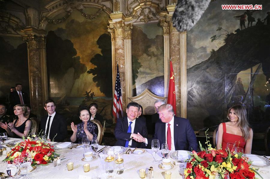 Chinese President Xi Jinping and his wife Peng Liyuan attend a welcome banquet hosted by U.S. President Donald Trump and First Lady Melania Trump in the Mar-a-Lago resort in Florida, the United States, April 6, 2017. [Photo: Xinhua/Lan Hongguang]