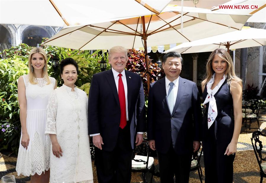 Chinese President Xi Jinping (2nd R) and his wife Peng Liyuan (2nd L) pose for a photo with U.S. President Donald Trump (C), his wife Melania Trump (1st R) and his daughter Ivanka Trump in the Mar-a-Lago resort in Florida, the United States, April 7, 2017. Chinese President Xi Jinping held the second round of talks with his U.S. counterpart Donald Trump here on Friday. [Photo:Xinhua]