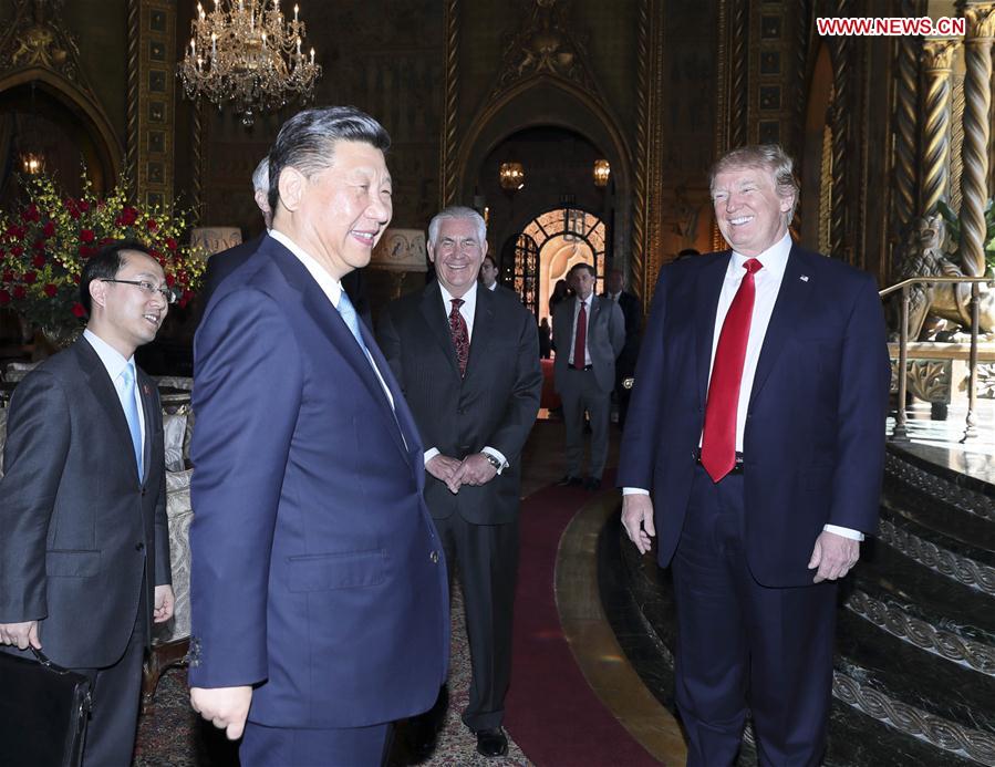 Chinese President Xi Jinping (2nd L) and his U.S. counterpart Donald Trump (1st R) hold the second round of talks in the Mar-a-Lago resort in Florida, the United States, April 7, 2017.  [Photo: Xinhua]