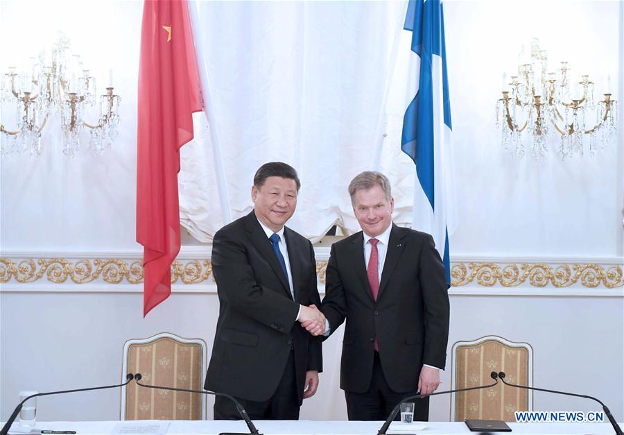 Chinese President Xi Jinping (L) and his Finnish counterpart Sauli Niinisto jointly meet the press after their talks in Helsinki, Finland, April 5, 2017. [Photo: Xinhua/Zhang Duo]