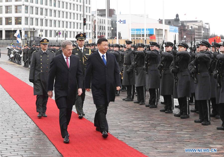 Chinese President Xi Jinping attends a welcoming ceremony held by his Finnish counterpart Sauli Niinisto before their talks in Helsinki, Finland, April 5, 2017. [Photo: Xinhua]