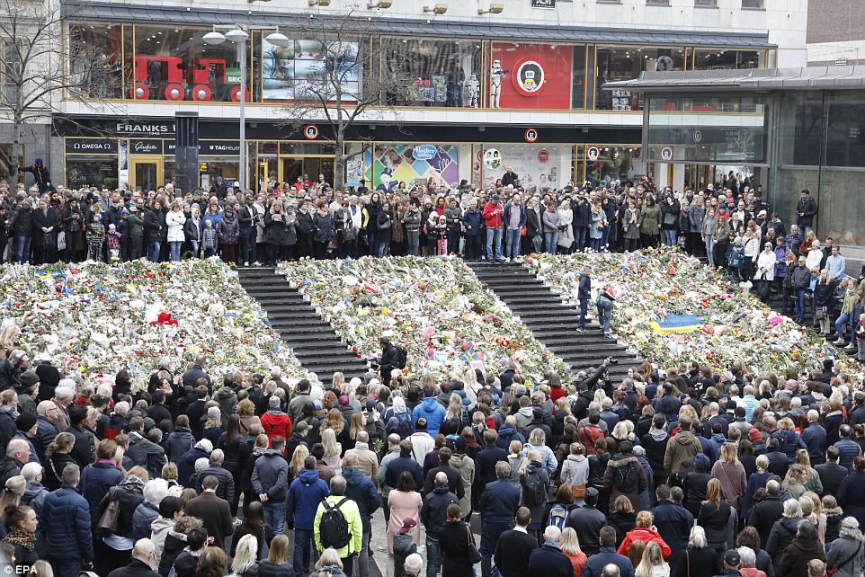 Flowers, flags and candles have also been laid in Sergels Torg square, where thousands more mourners gathered on Monday, March. 10, 2017. [Photo: EPA]