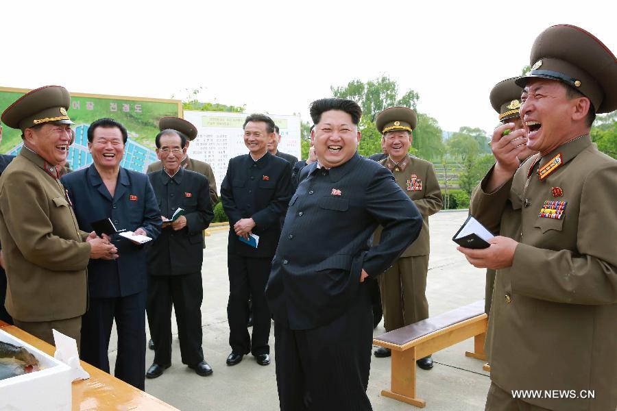 File photo provided by Korean Central News Agency (KCNA) on May 15, 2015 shows top leader of the Democratic People's Republic of Korea (DPRK) Kim Jong Un (C) recently inspecting Sinchang fish farm under Unit 810 of the Korean People's Army (KPA). [Xinhua/KCNA]