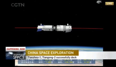 Tianzhou-1 cargo spacecraft successfully docks Tiangong-2 space lab. They will stay together for two months, completing 3 experiments. [Screenshot: China Central Television]