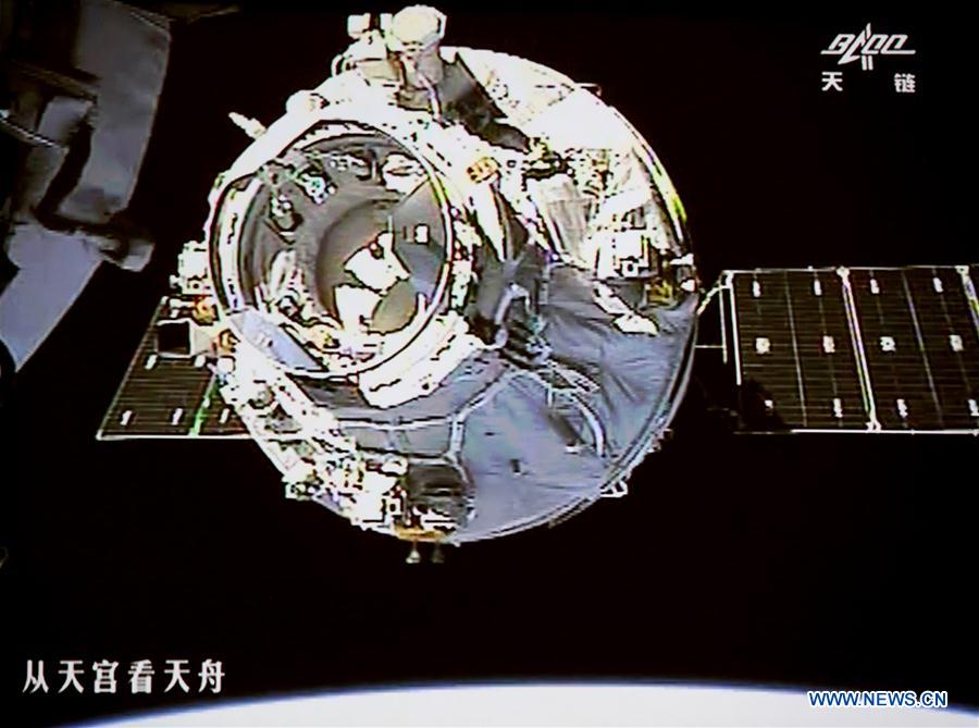 Photo taken on April 22, 2017 shows the Tianzhou-1 cargo spacecraft moving towards the orbiting Tiangong-2 space lab for the automated docking on a screen at Beijing Aerospace Control Center in Beijing, capital of China. [Photo: Xinhua/Wang Sijiang]