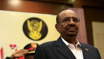 Sudan’s President Omar al-Bashir listen to the National anthem during opening session of Sudan National Dialogue conference October 10, 2015.[Photo: Reuters]