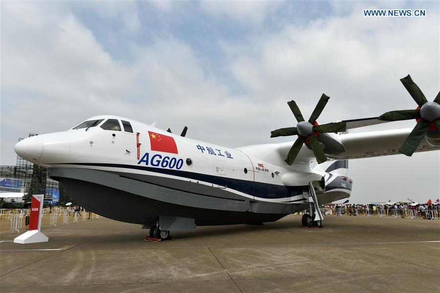 An amphibious aircraft AG600 is displayed for the 11th China International Aviation and Aerospace Exhibition in Zhuhai, south China's Guangdong Province, Oct. 30, 2016. The AG600 is by far the world's largest amphibian aircraft, about the size of a Boeing 737. [Photo: Xinhua]