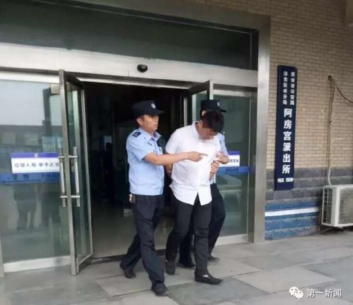A young man who hired around 100 people pretending to be his friends at his wedding is detained by police on fraud charges in Xi'an, capital of Shaanxi province, on Tuesday, May 2, 2017. [Photo: Shaanxi Broadcasting Corporation]