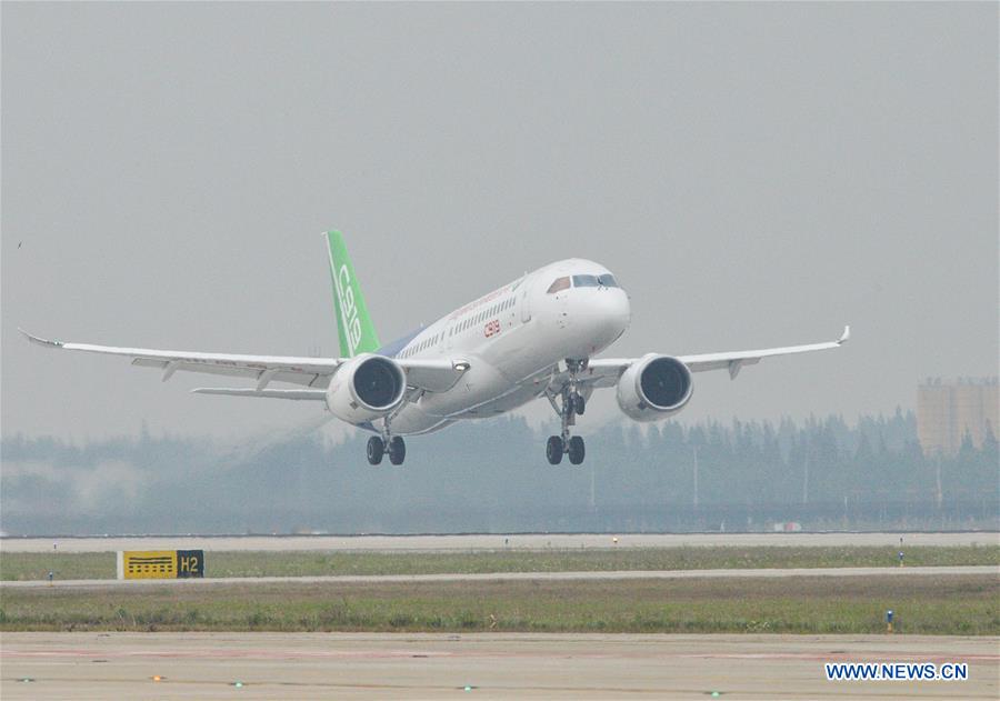 China's homegrown large passenger plane C919 makes its maiden flight in Shanghai, east China, May 5, 2017. [Photo: Xinhua/Ding Ting]