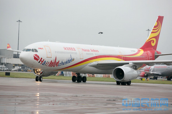 A file photo shows a Hainan Airlines plane arriving in Manchester, UK. [Photo: caacnews.com.cn]