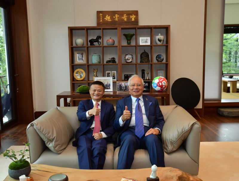 Malaysia's Prime Minister Najib Razak poses photo with Jack Ma on Friday, May 12, 2017. [Photo provided by Alibaba Group]