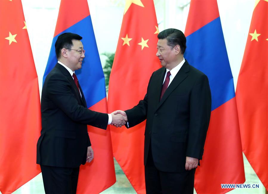 Chinese President Xi Jinping (R) meets with Mongolian Prime Minister Jargaltulga Erdenebat at the Great Hall of the People in Beijing, capital of China, May 12, 2017. Jargaltulga Erdenebat is in Beijing to attend the Belt and Road Forum for International Cooperation.[Photo: Xinhua]